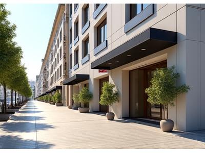 Entrada exterior del edificio de oficinas de Vida Serena en una calle soleada de Valencia.